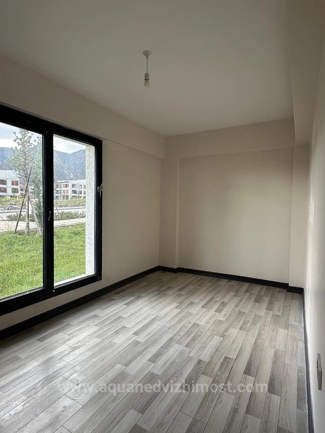 Köyceğiz De Site İcinde Bahçe Kat Tum Odalari Klimali 3+1 Kiralik Daire